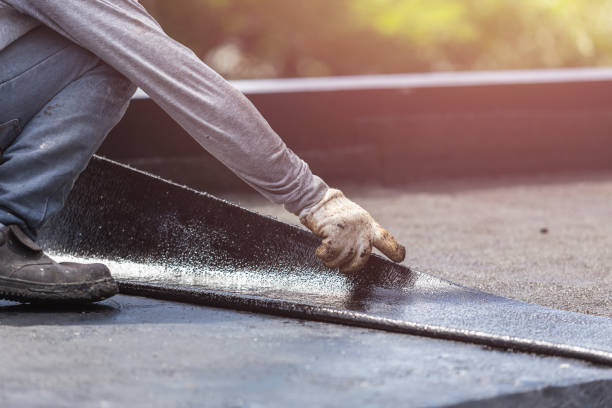 Professional Basement Waterproofing technician working in Macomb, IL
